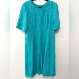 Embossed turquoise A-line dress with black zipper